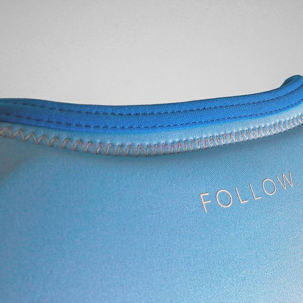 FollowのCorp Ladies（水色）レディースインパクトベストの背面ロゴ